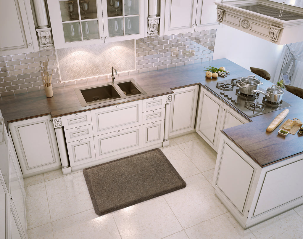 A granite topaz WellnessMat in a kitchen